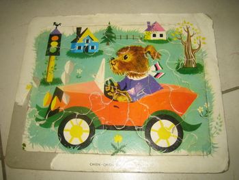 puzzle chien en voiture vintage avec contour une 20aine de pièce