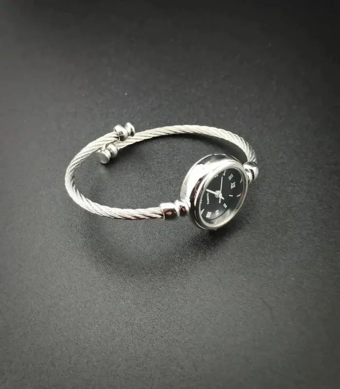 Montre bracelet argentée & noire, style vintage - photo numéro 3