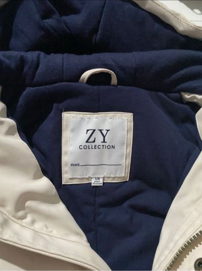 Manteau coupe vent et  blanc intérieur bleu marine ta 7/8 ans - photo numéro 3