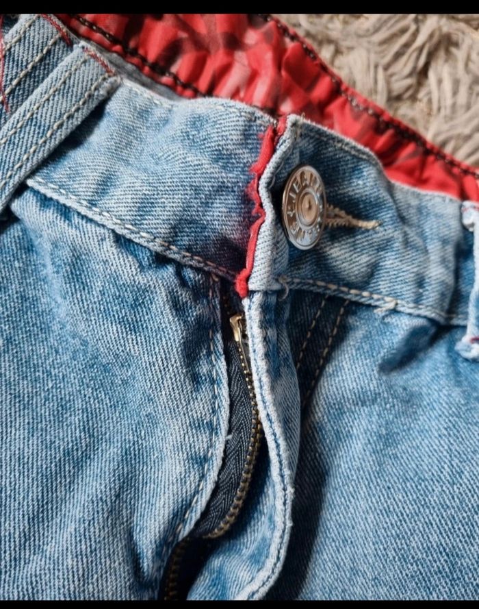 Jeans à trous taille 44 mixte - photo numéro 5