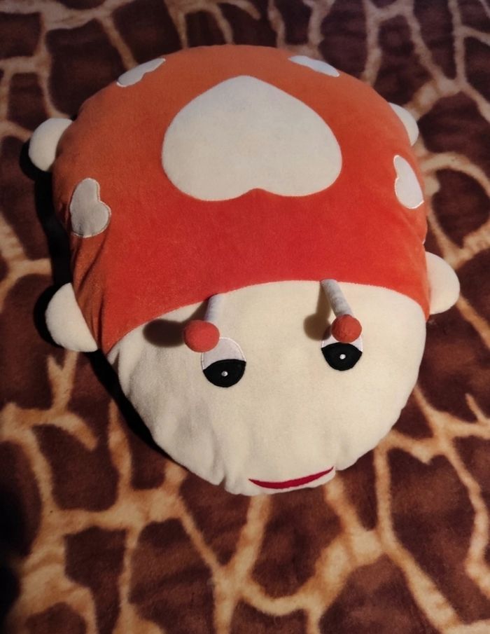 Gros coussin coccinelle