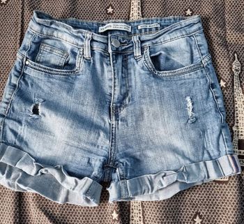 Short en jeans à trous (High Waist) taille 36