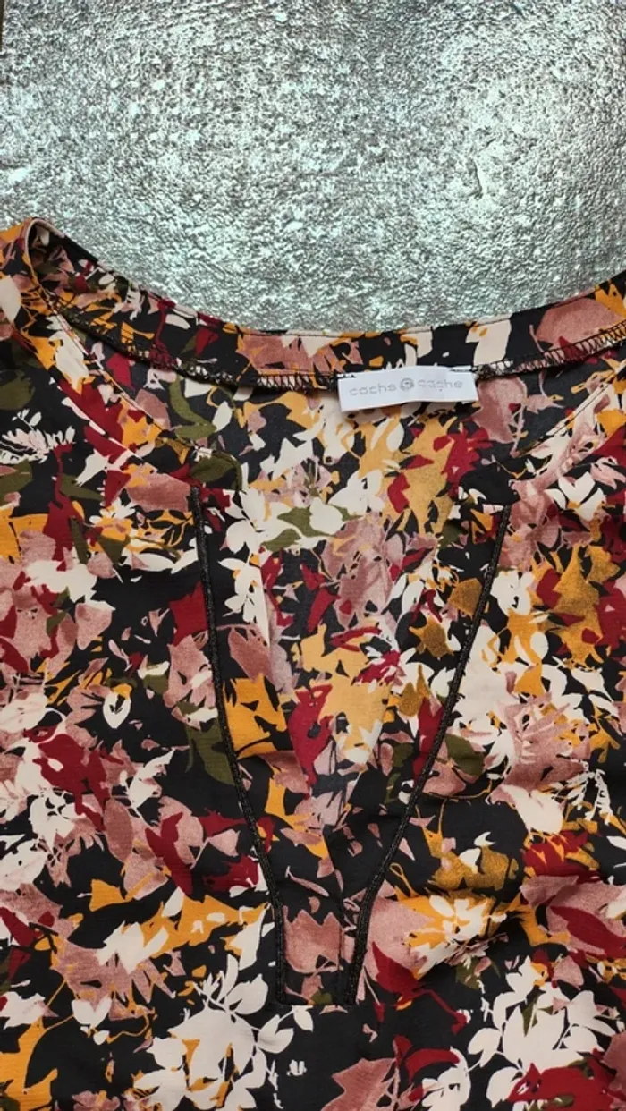 Cache cache robe 👗 fleuri taille 38
Excellent état très peu portée - photo numéro 3
