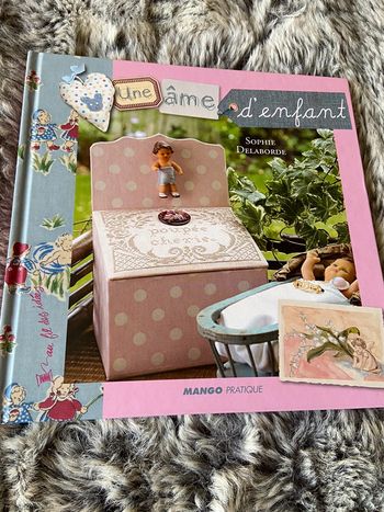 Une âme d’enfant, point de croix et ouvrages pour enfants