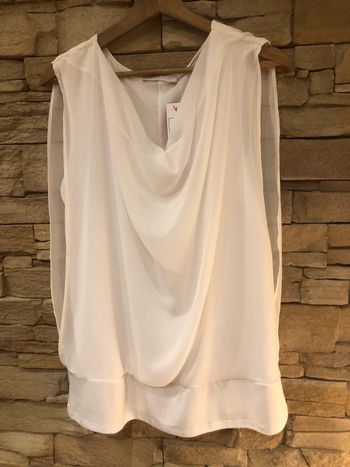 Joli haut blanc taille 4 Armand Thierry