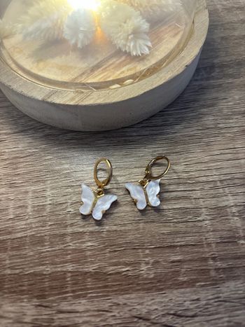 Boucle d’oreille papillon