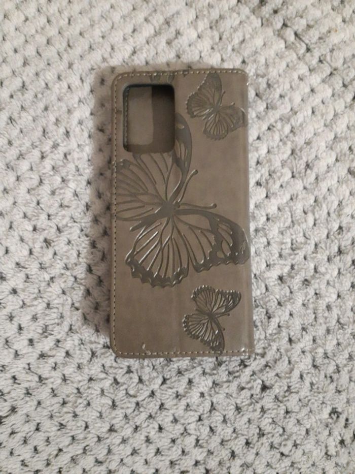 Housse de téléphone remi note 12,état neuf - photo numéro 4