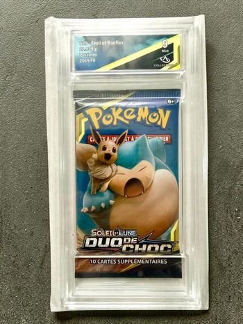 Booster Pokémon Duo de Choc Évoli & Ronflex gradé 9 CollectAura – SL9 FR scellé
