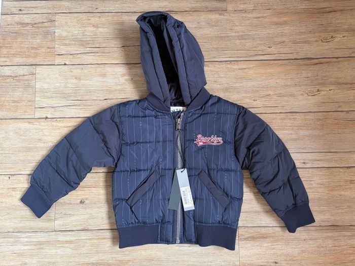 Doudoune IKKS taille 4 ans. Neuve étiquetée