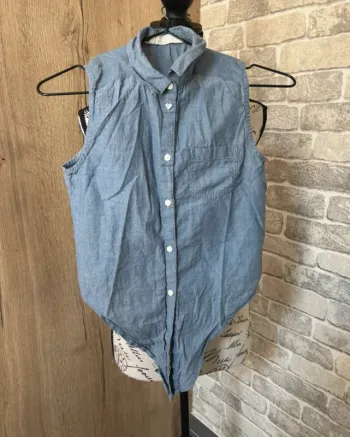 Chemise sans manches fille taille 11/12 ans