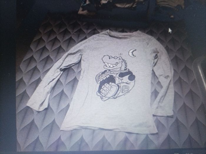 Pull longues manches dino de l'espace