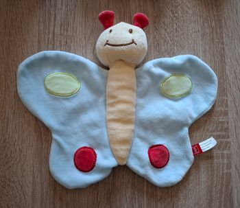 Doudou papillon tex