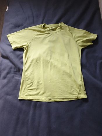 Haut sport femme marque Quechua taille L