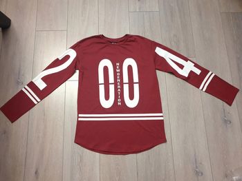 Maillot manche longue bordeaux.Neuf. Garçon 13/14 ans. Marque Tex
