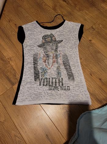 Tee short noire XS bonne etat