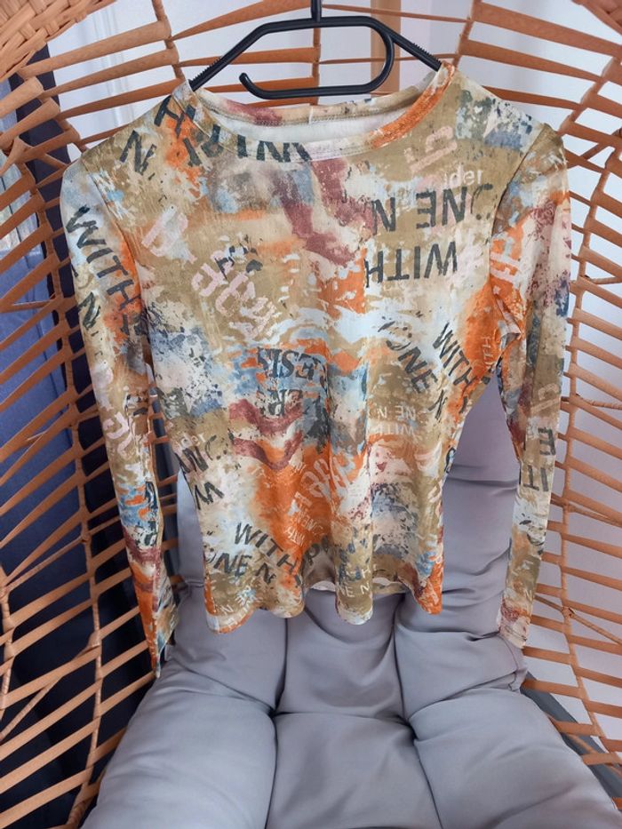Blouse manches longues a motif femme taille 38