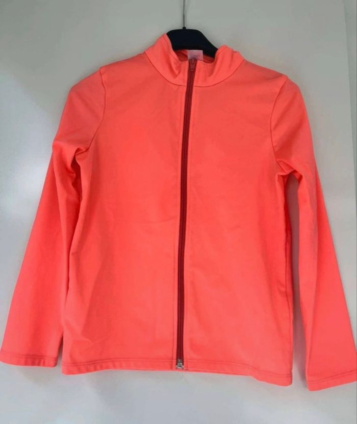 Gilet à Tirette de sport décathlon taille 8/9 ans (131/140cm) Tres bon état Couleur orange
