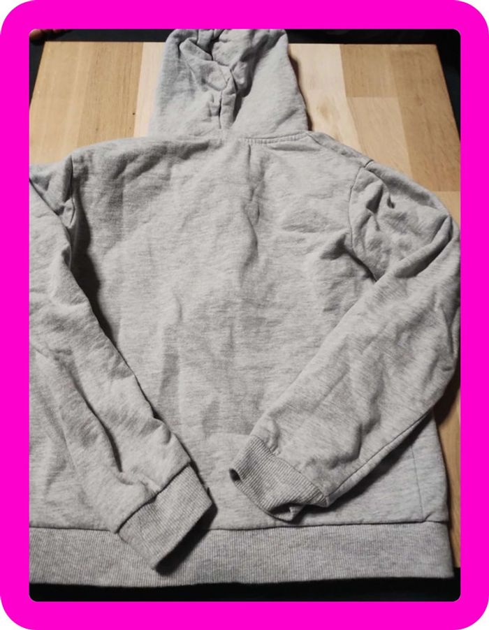 Gilet à capuche reine des neiges taille 7/8 ans en très bon état - photo numéro 2