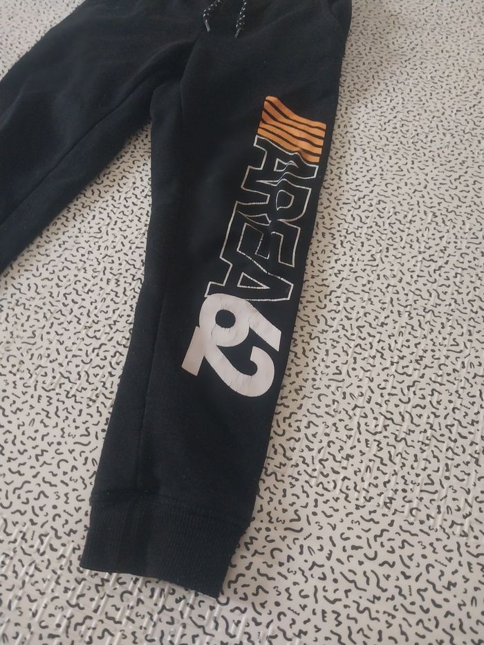 Jogging noir garçon 6-7 ans dopodopo – AREA62