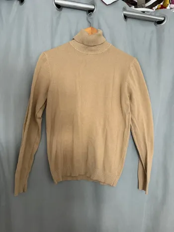 Pull col roulé