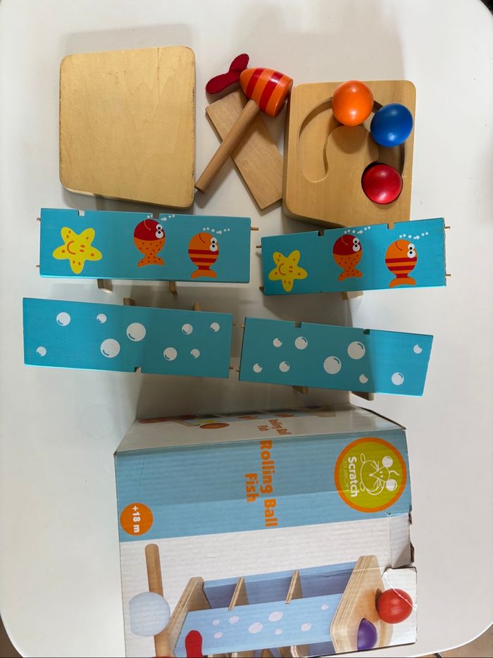 Jouet bois bébé Rolling ball fish scratch - photo numéro 2