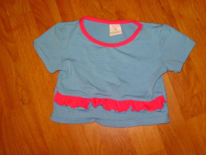 Tee shirt turquoise et rose taille 6 ans TBE