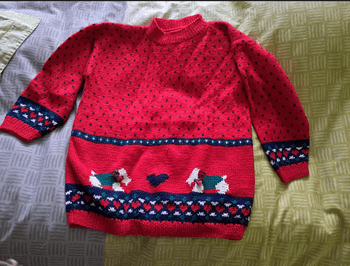 Pull laine 10- 12 ans, rouge à motifs