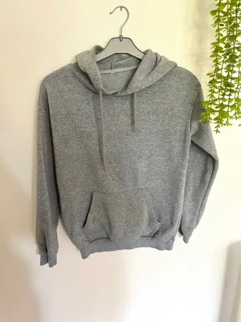 Très beau pull à capuche longue manche femme