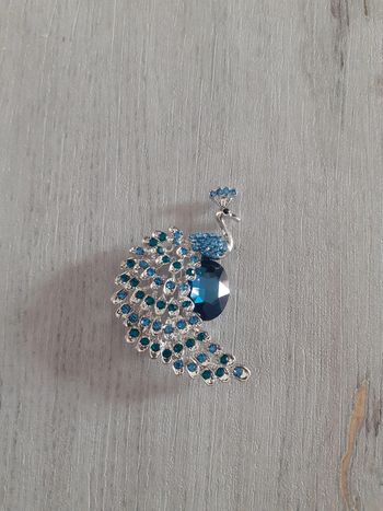 Broche paon