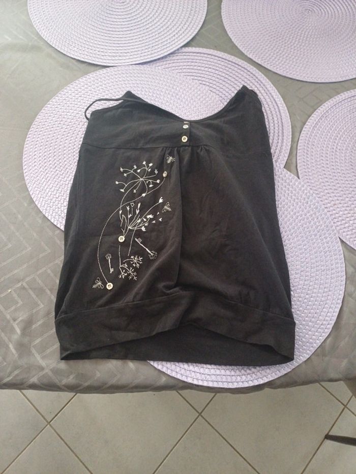 Top femme noir avec dessin fleur taille M