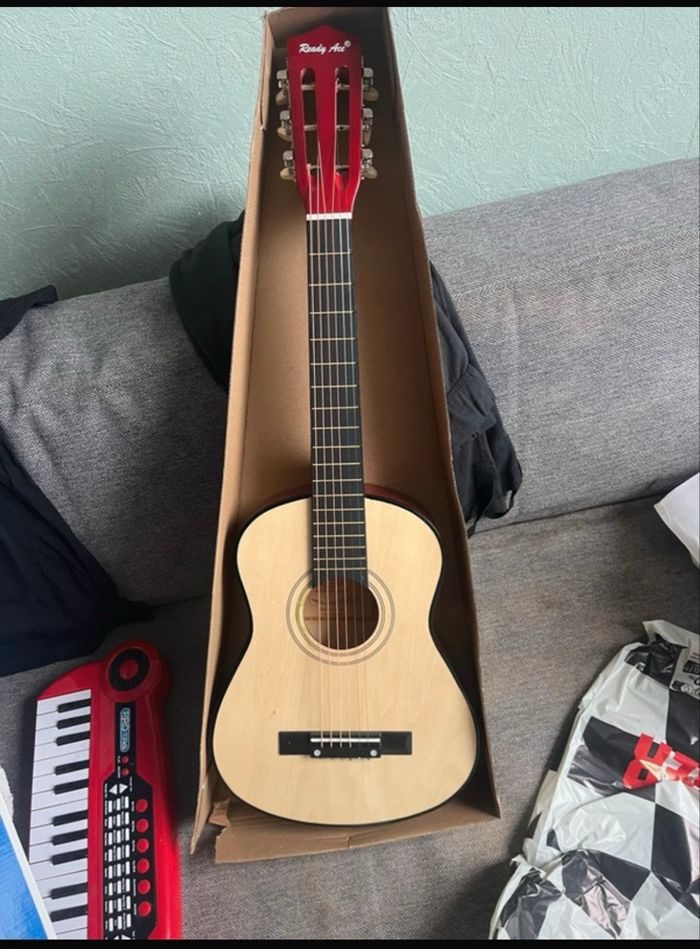 Guitare enfant jouet - photo numéro 3