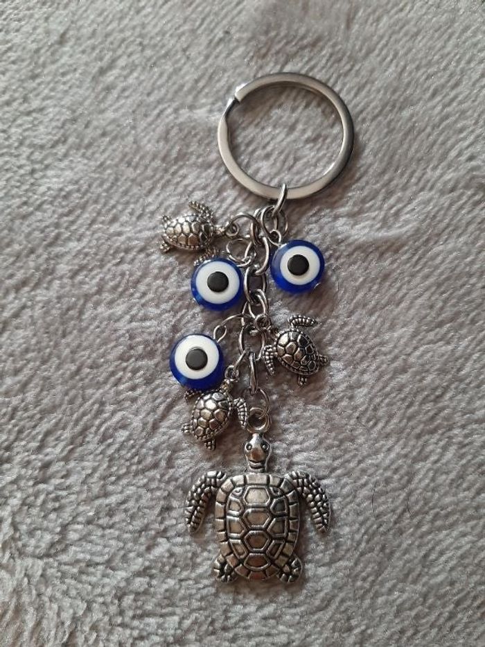 Porte clé tortue œil bleu