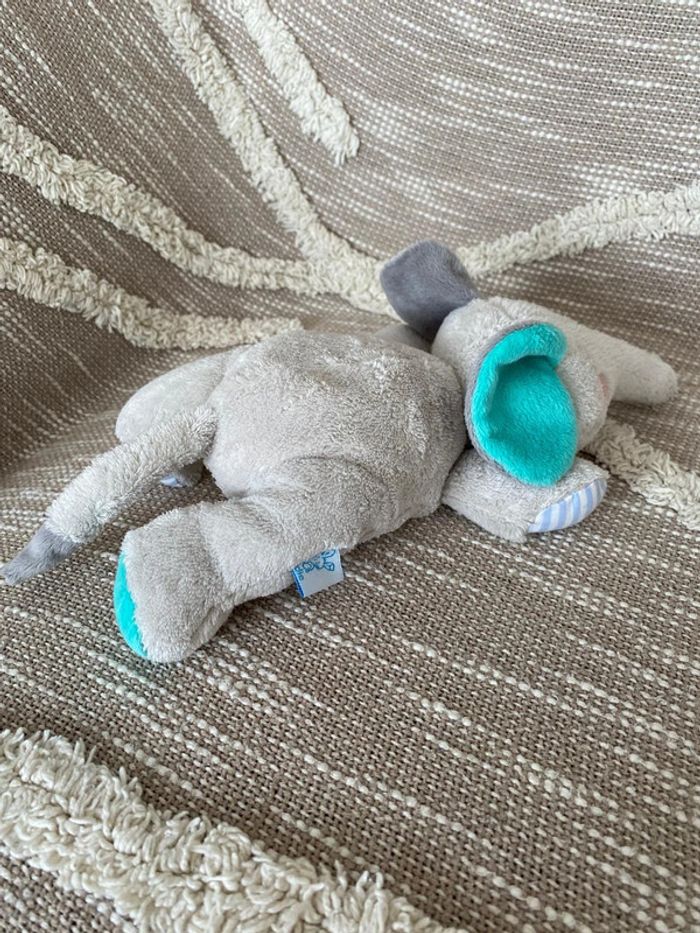 Peluche doudou bouillotte 27cm Dodie éléphant allongé gris et bleu très bon état - photo numéro 3