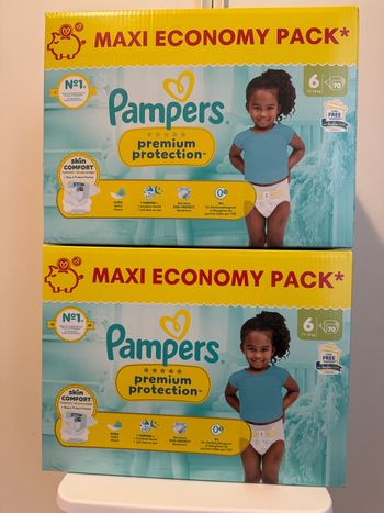 140 couches Pampers premuim protection taille 6