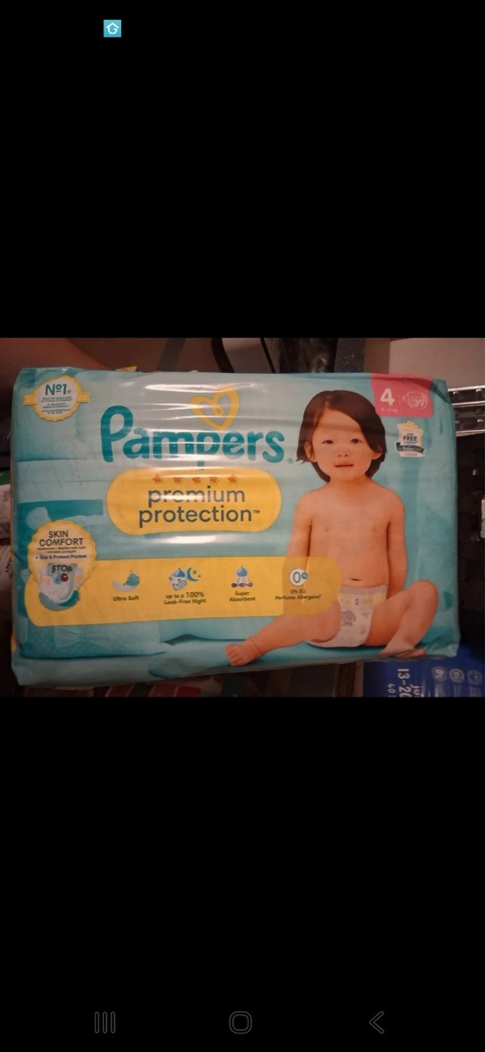 2 paquets Pampers T4