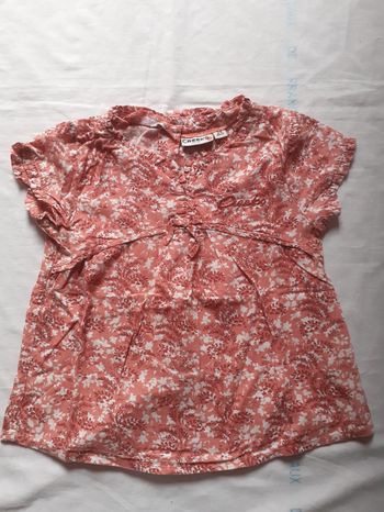 Chemise orange motif fleurs blanches