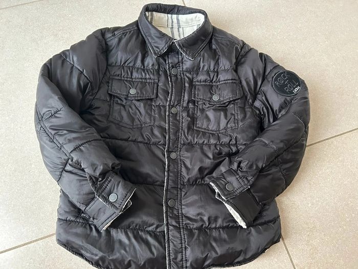 Doudoune réversible noire et carreaux garçon IKKS 5ans