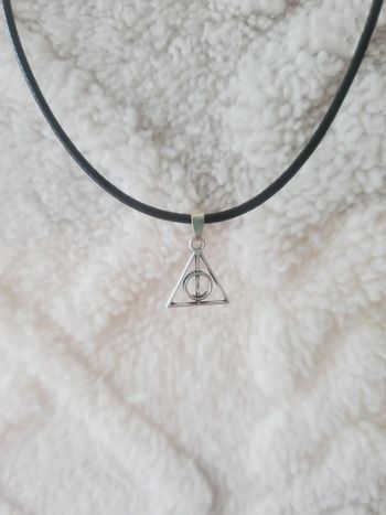 Collier avec un pendentif harry potter