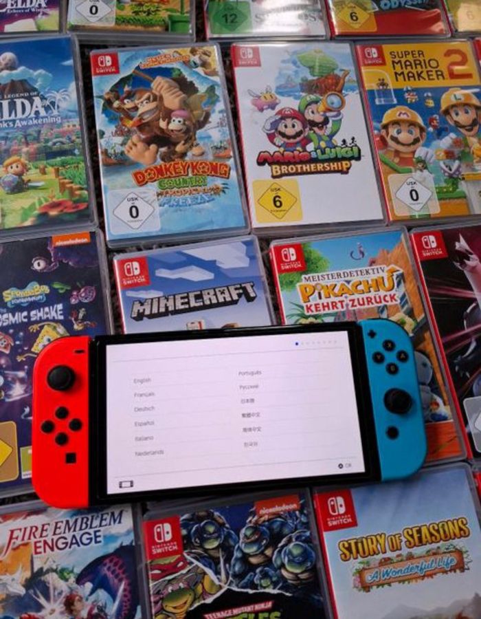 Nintendo switch OLED et discs - photo numéro 2