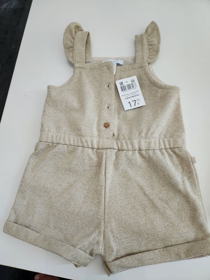 Petite combinaison doré neuve