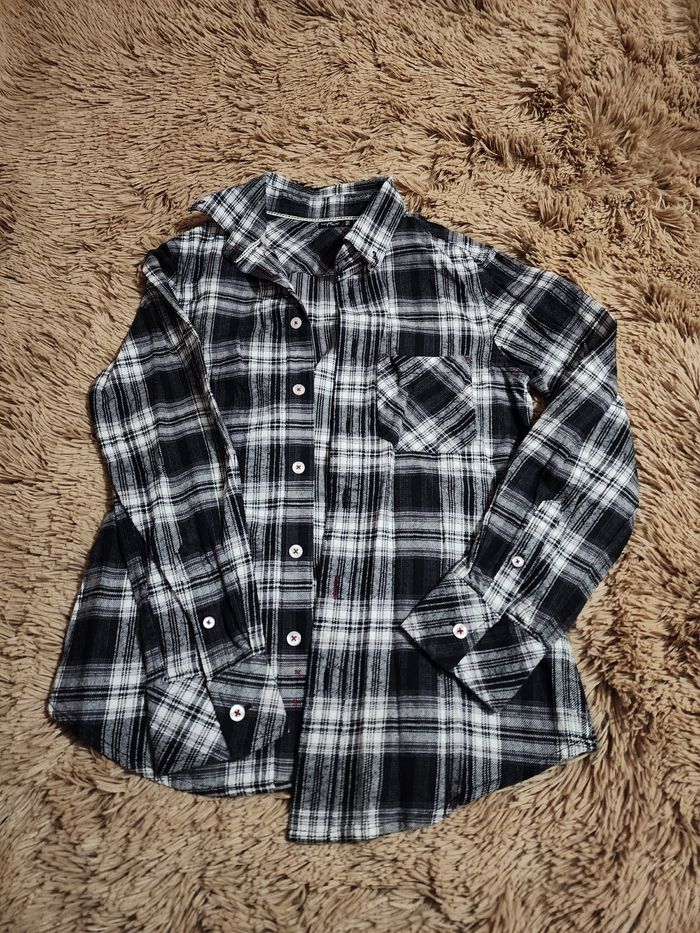 Chemise à carreaux noire