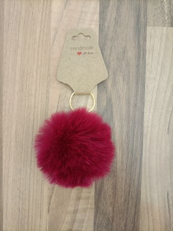 Porte clé pom-pom neuf or et bordeau