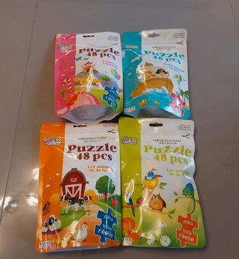 Lot de 4 puzzles de 48 pieces neufs