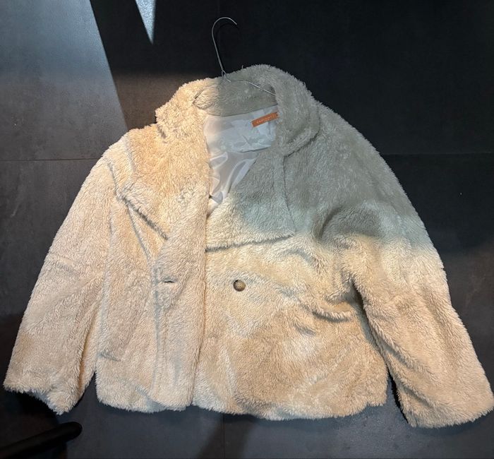 Manteau fausse fourrure
