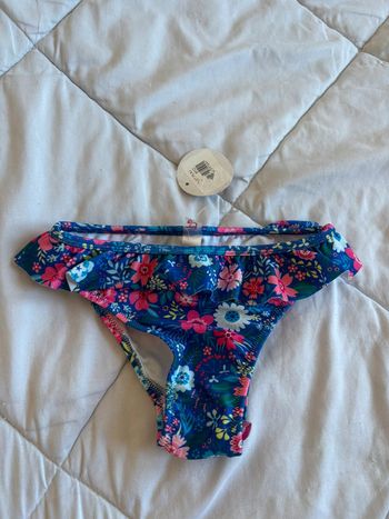 Bas de maillot de bain enfant fille bleu volant motif fleurs Penti taille 5/6 ans neuf