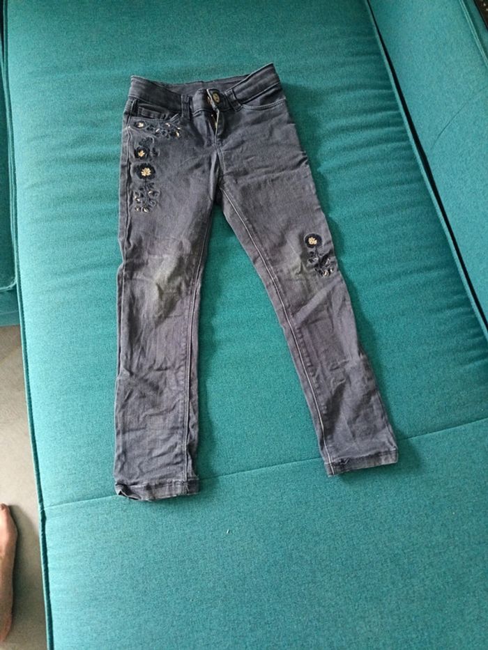 Jeans motif fleur reglable