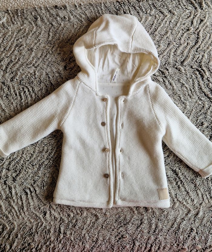 Veste a capuche beige bébé