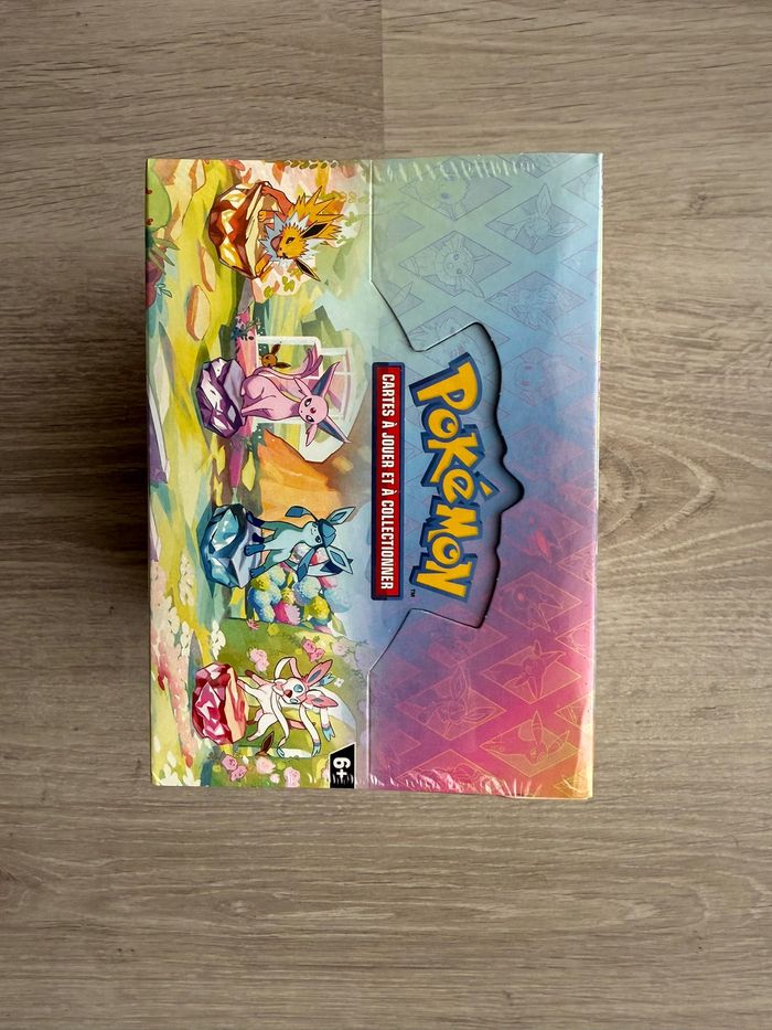 Display Pokémon Mini tins Évolutions Prismatiques EV8.5 Scellée