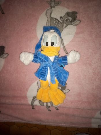 Peluche Donald en robe de chambre