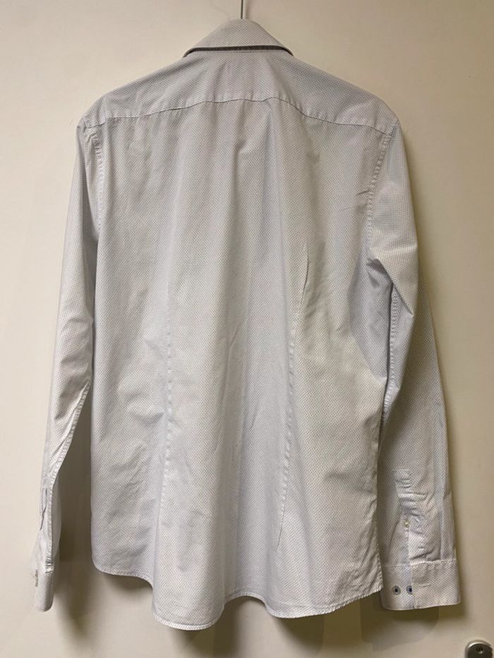 Superbe chemise blanche à motif bleu Calvin Klein taille L 40 traces au col sinon impeccable - photo numéro 3